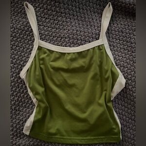 Green cropped tank top with white stripe on the side